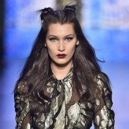 bella hadid with space bun wavy hairstyle on the anna sui runway