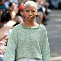 Black model with white blonde short afro TWA